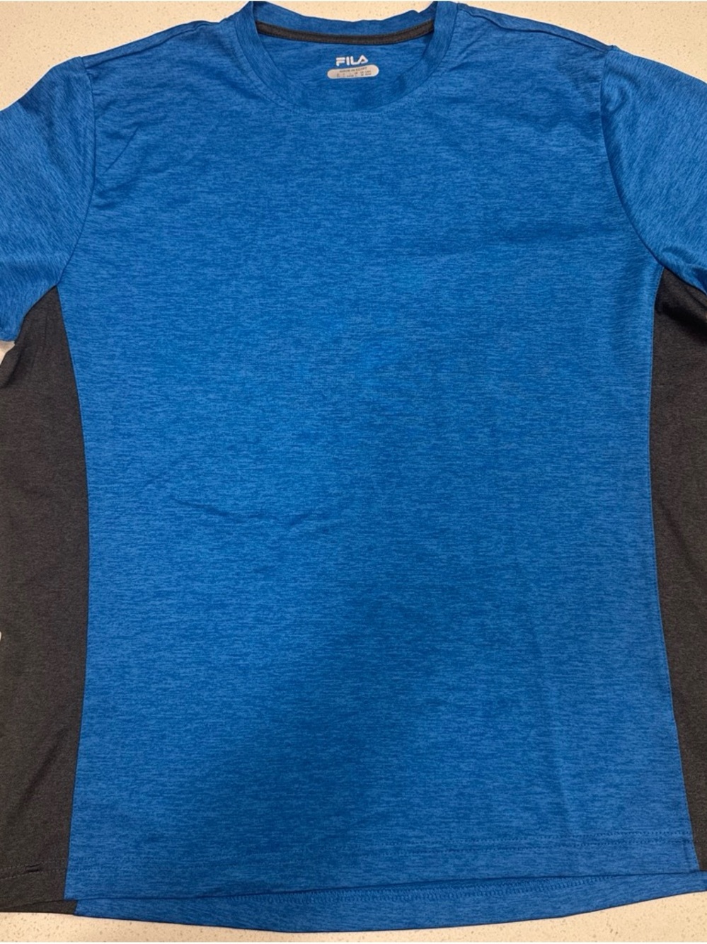 FILA Blue Tee with Black Neck Trim and Gold Print